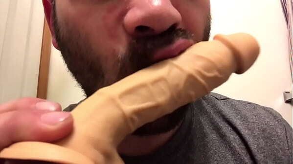 Teasing mouth with dildo then deep throating