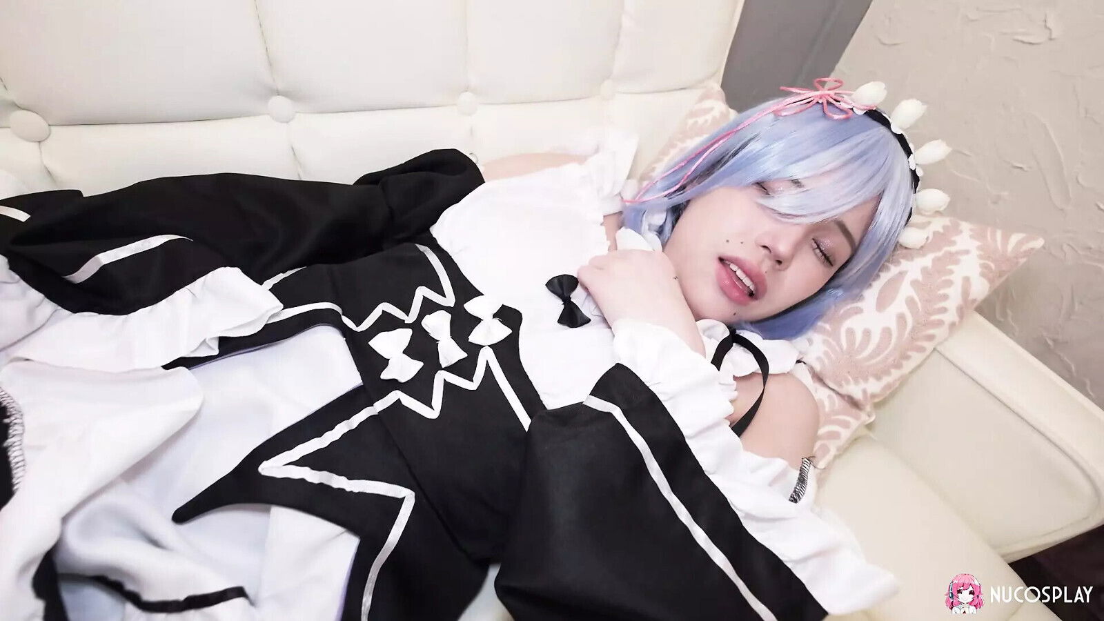 Asian maid Akino rubbed with dildo clit while moaning couch.