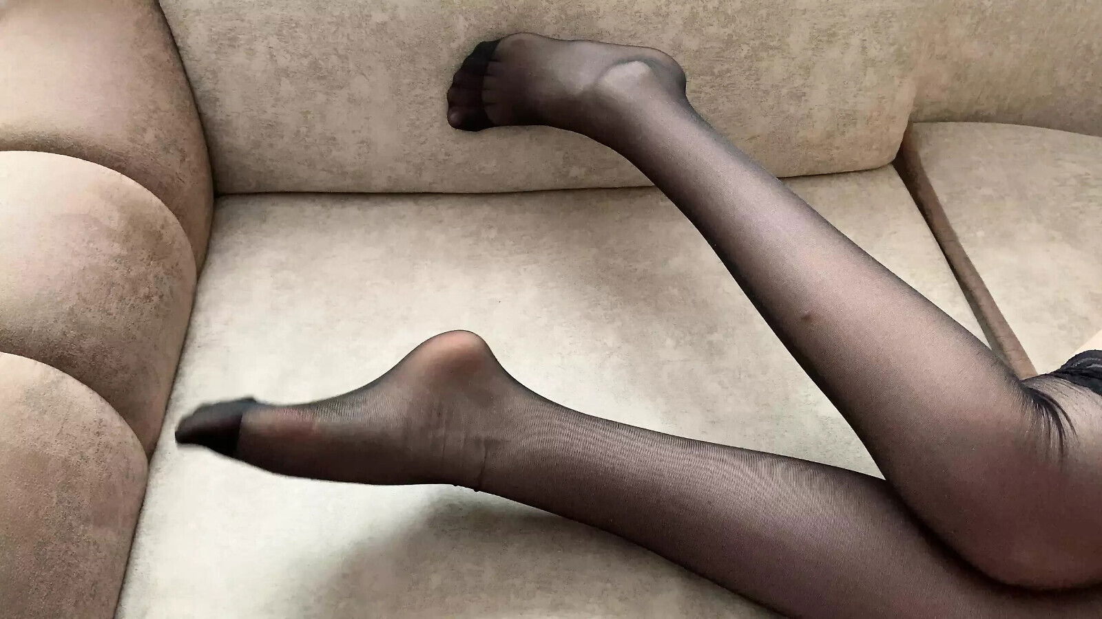 Girl black stockings caresses long legs