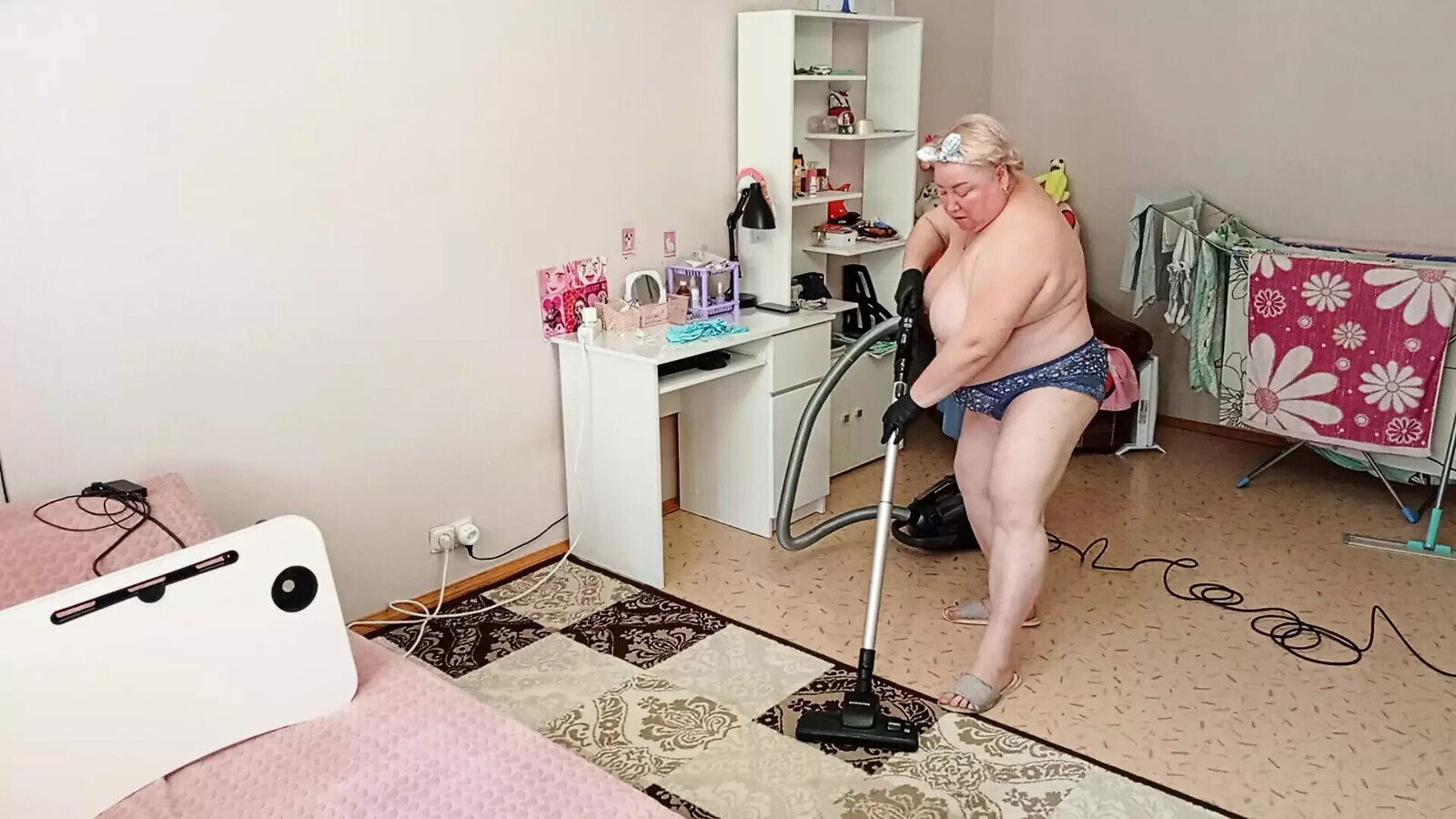 Mother-in-law vacuums room naked