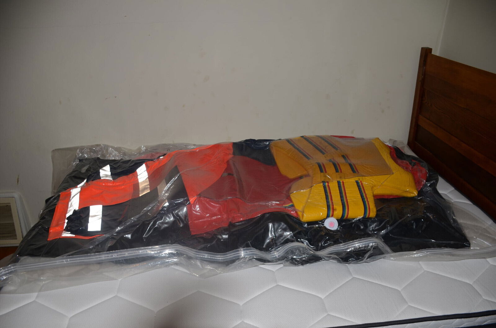 Change VacPacked with gear, raincoats aprons sleepsacks sheeting