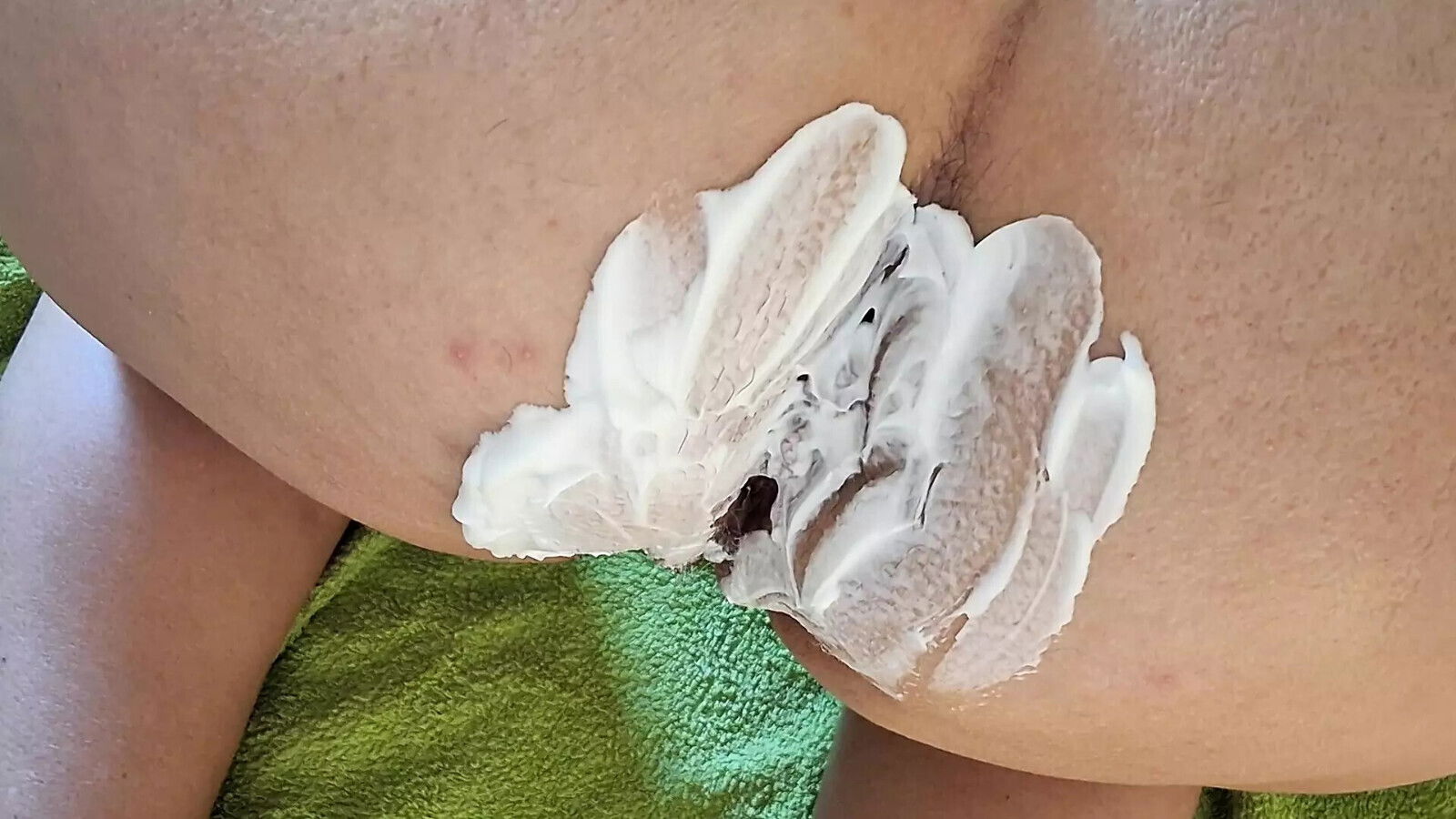 Close-up hair removal fingers