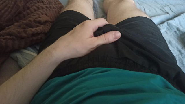 shorts erotically strokes groin
