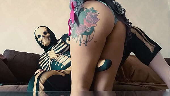 Horny skeleton play with sexy boobs girl