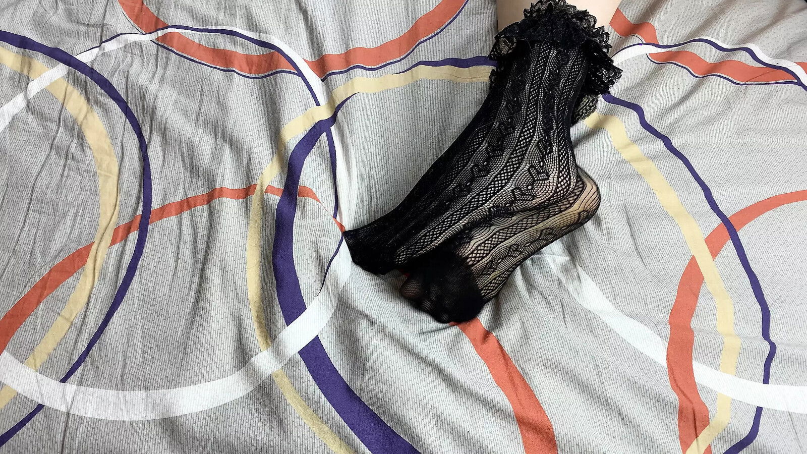 Caressing long legs girl black lace socks