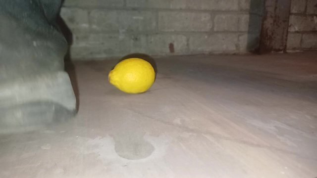Lemon Crush Slow Motion Under Dirty Boot