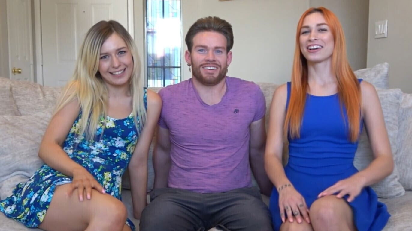 girls play strip darts game with their male friend