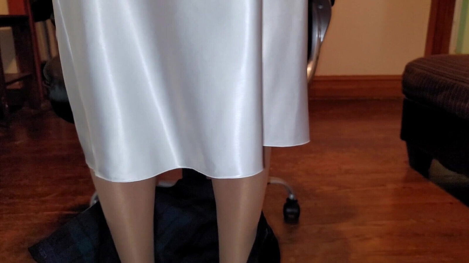 Pleated skirt with white satin half slip