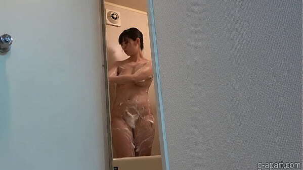 beautiful Japanese girl takes shower