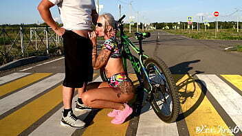 Risky blowjob from a hot blonde in the middle of a city intersection, deepthroat, big boobs and cum in mouth