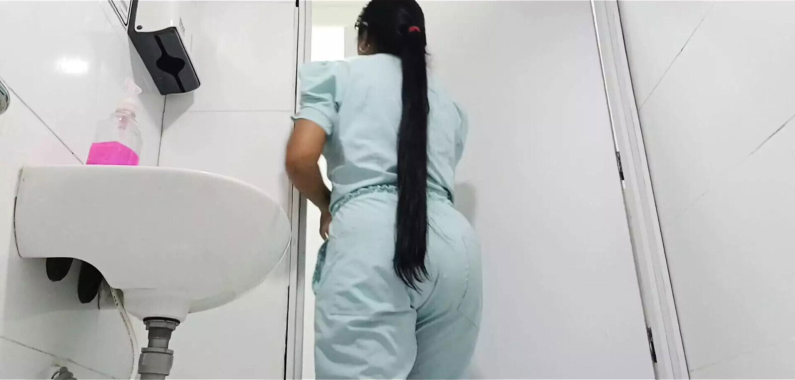 Amateur camera public bathroom captures nurse pissing