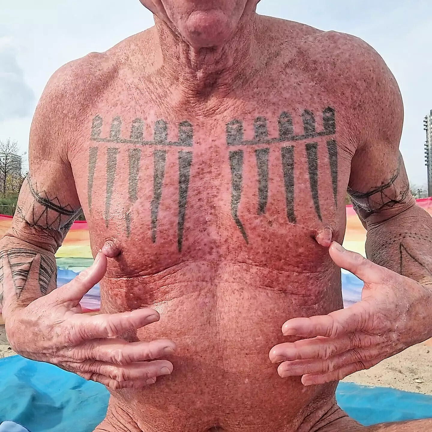 Playing with nipples beach