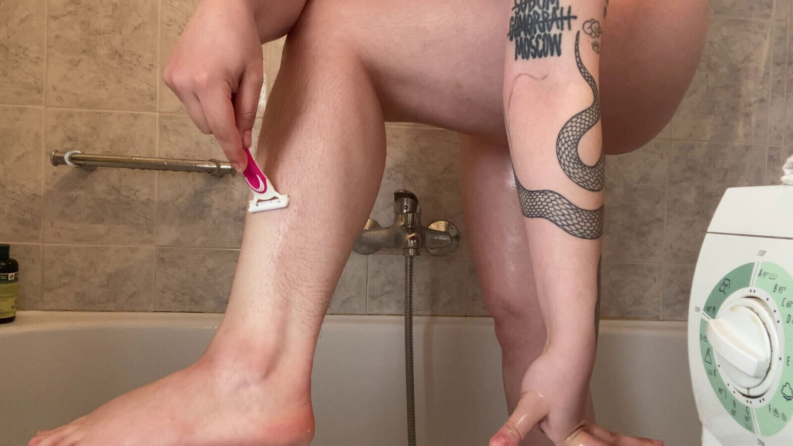Shaving very hairy legs bathroom with razor
