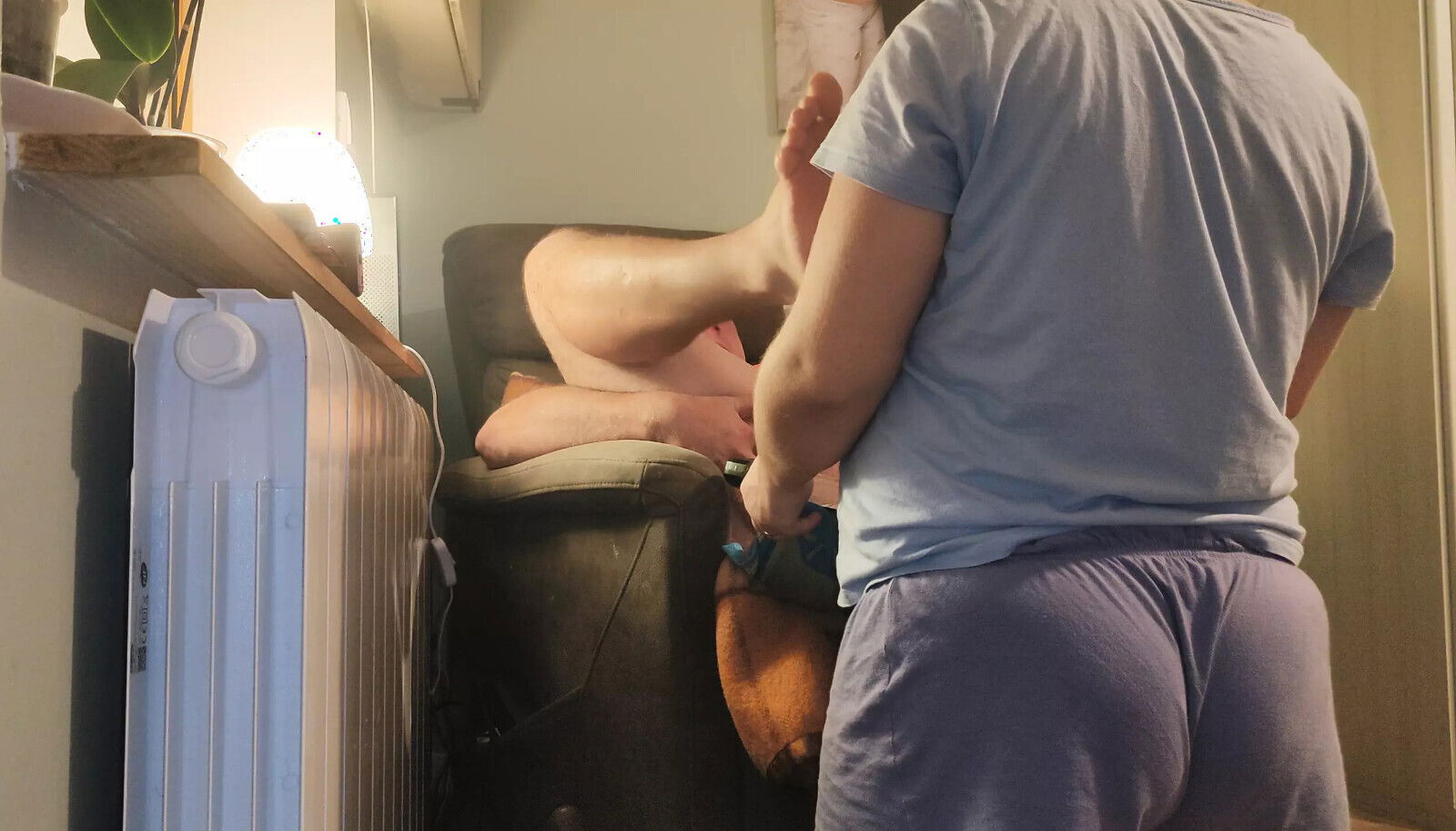 beautiful short women's dress sniffs liquide gives himself back showing