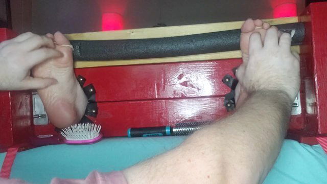 Toes tickled and vibed to whimpering orgasm