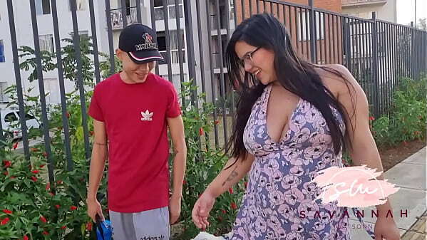 Pregnant woman with neighbor stairs building where they live Savannah Watson