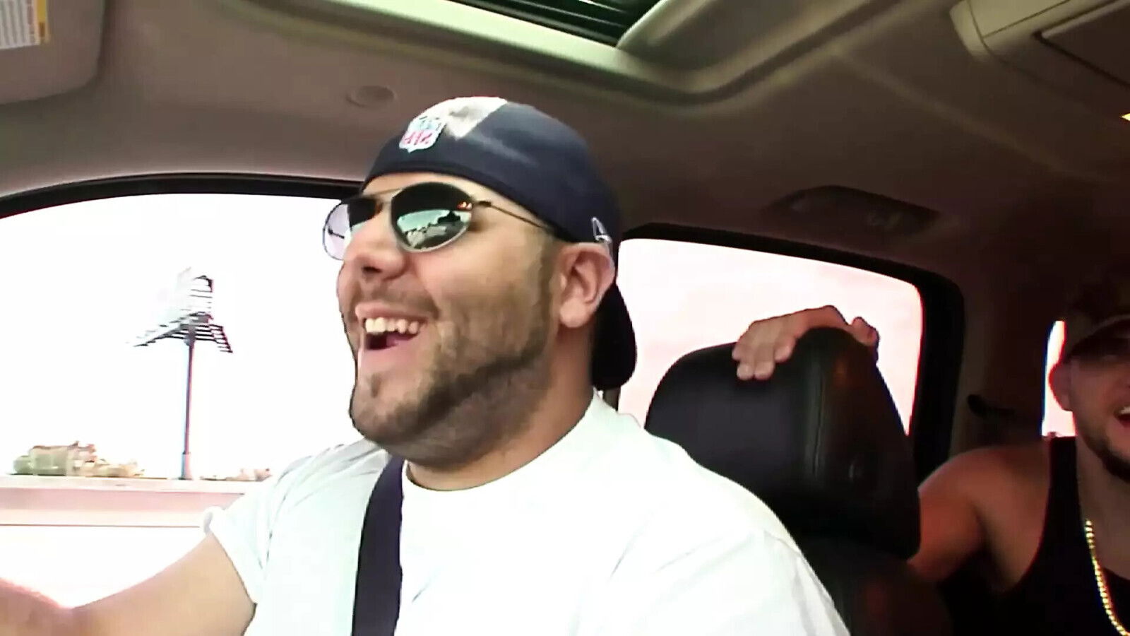 Three guys fingering woman