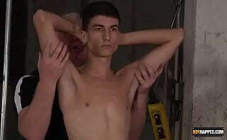 Kinky DILF torments restrained amateur