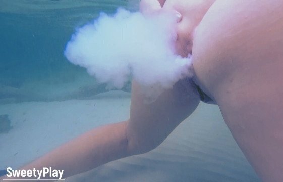 Ocean underwater milk enema from asshole