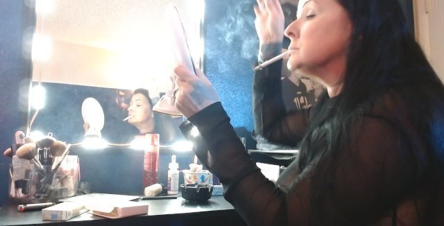 Dangling Long Virginia Slims Cigarette Doing Makeup Smoking Hands Free