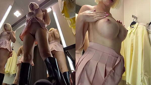 Upskirt view public fitting room pussy blonde with