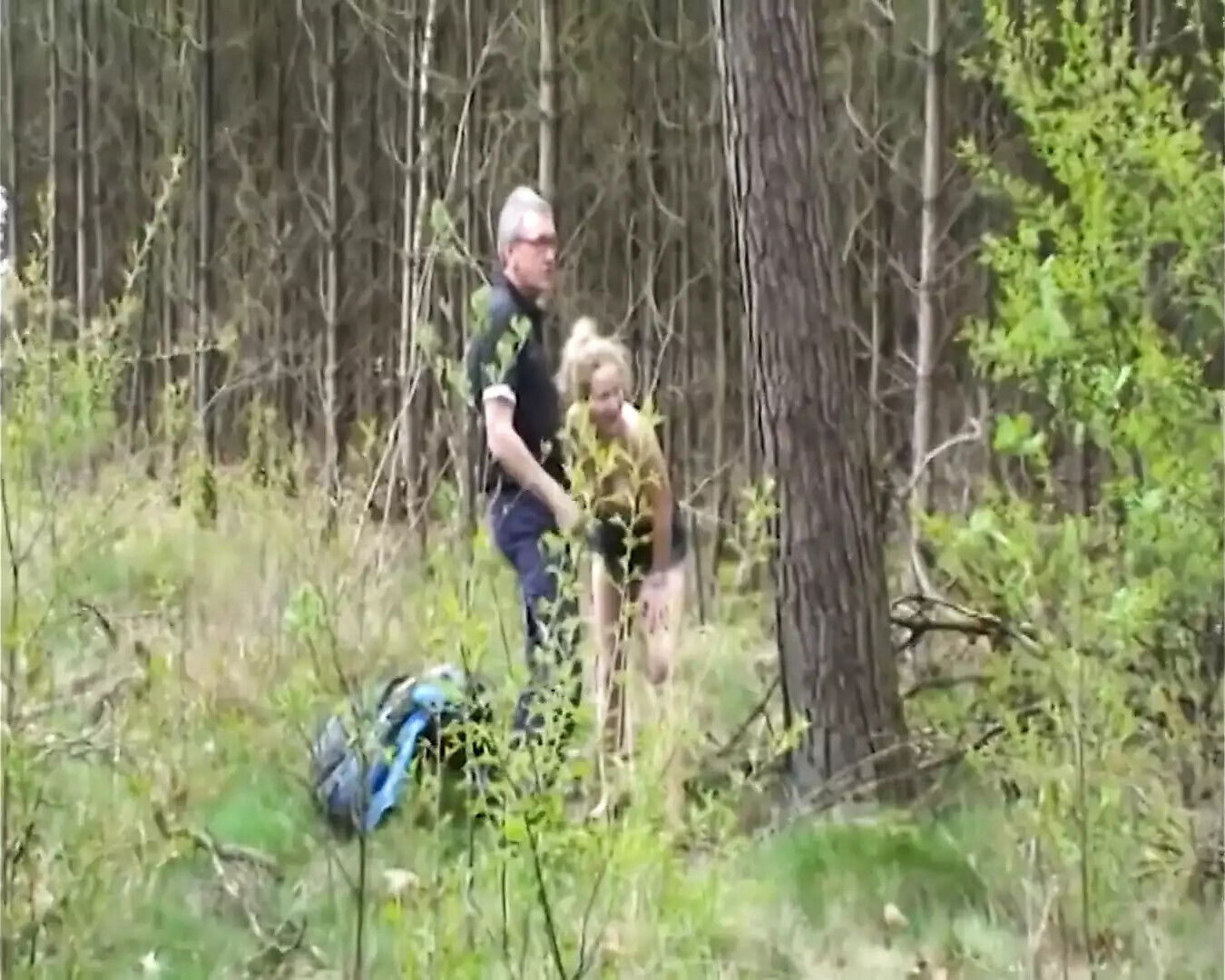 Naughty teen blowing hard cocks outdoors