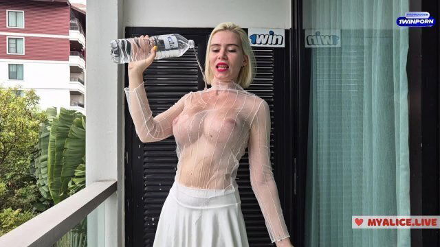 Wet. transparent clothes with water. Touch lets together