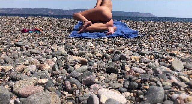 Girl going naked sunbathing nude beach