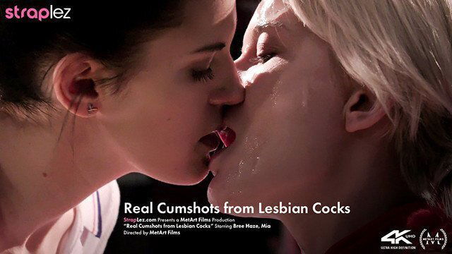 Squirting strapless dildo cums lesbian's face pussy