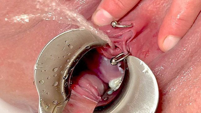 Strong Stream from spread Pussy Speculum