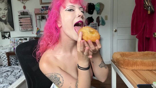 eating donut made while topless