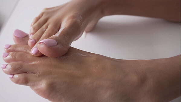 Beautiful brunette gives footjob feet Ashley Sanz