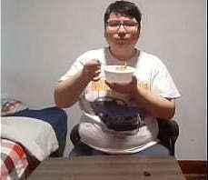 Fat guy eats cereal