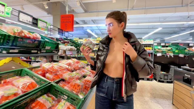 walking around supermarket shiny down jacket with bare