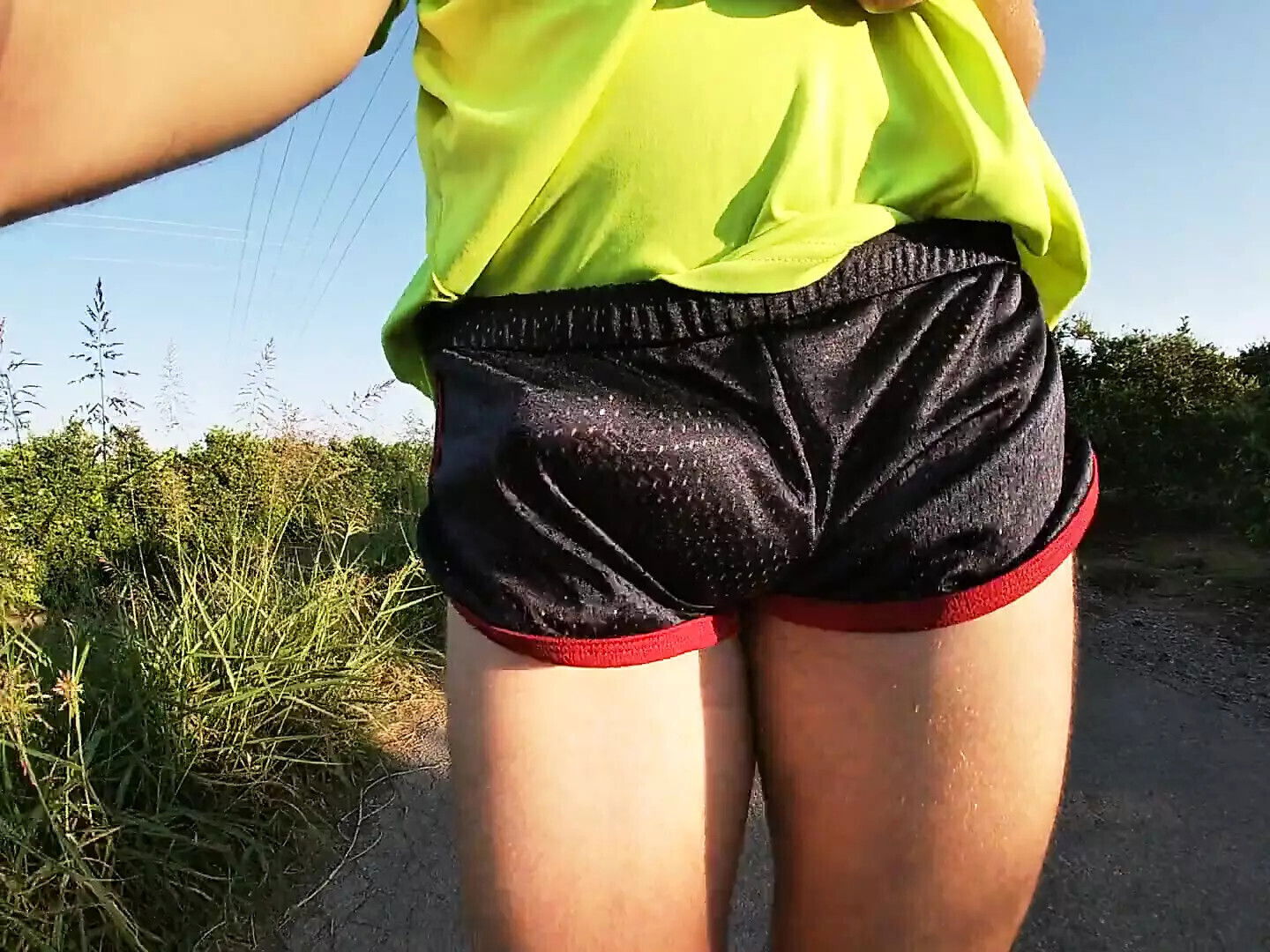 Tight shiny sport shorts bulging routine (freeballing public place)