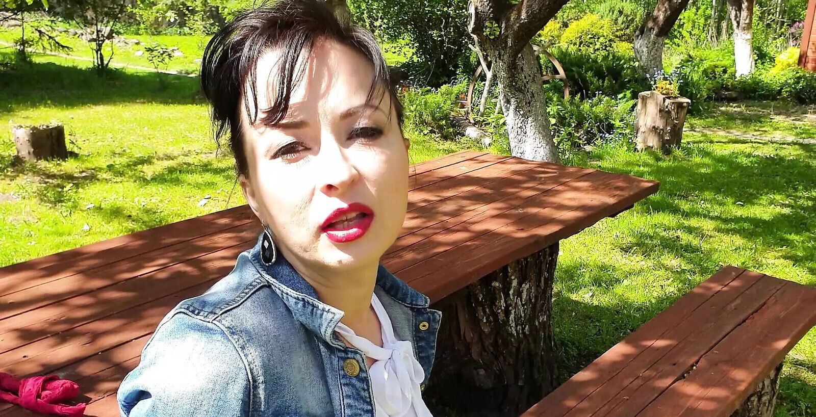 Wanking stocking beneath shady apple trees.