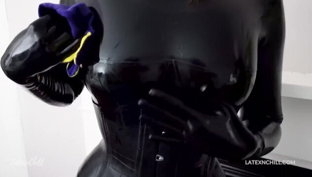 Latex model shining black rubber catsuit first time