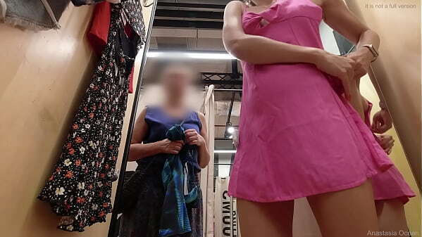 stepmother helps clothes naked body public fitting room.