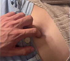 We relax while I play with her belly button