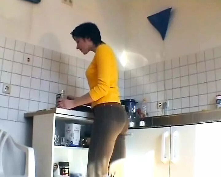 German slut plays with cucumber sucks dick kitchen