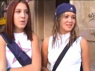 Elizabeth Douglas and Trisha Annabelle smoking in the street