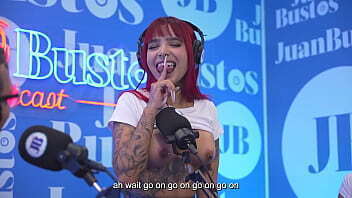 Tattooed redhead Diavlolilith kisses with friend while vagina vibrates Juan Bustos Podcast