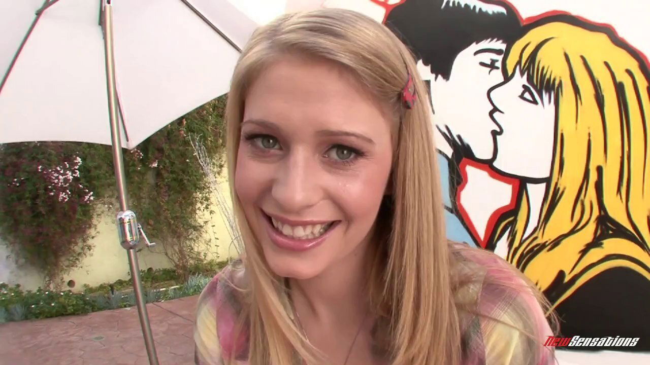 Young Allie James deepthroats outdoors
