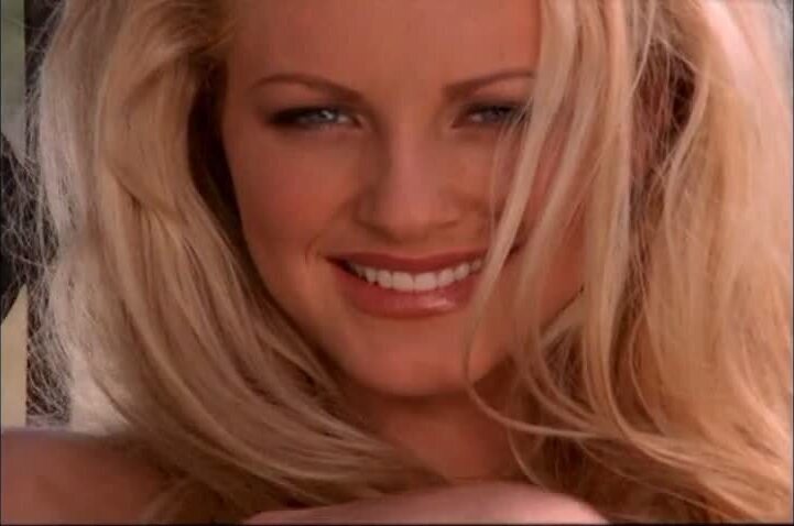 Divini horny blonde hottie poses naked near saloon