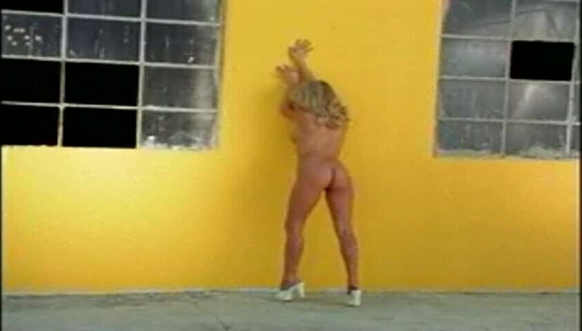 Angela Little stunning blonde poses naked outside house