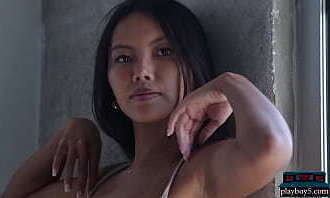 Petite Asian teen Playboy model Vivian strips nude in a softcore video