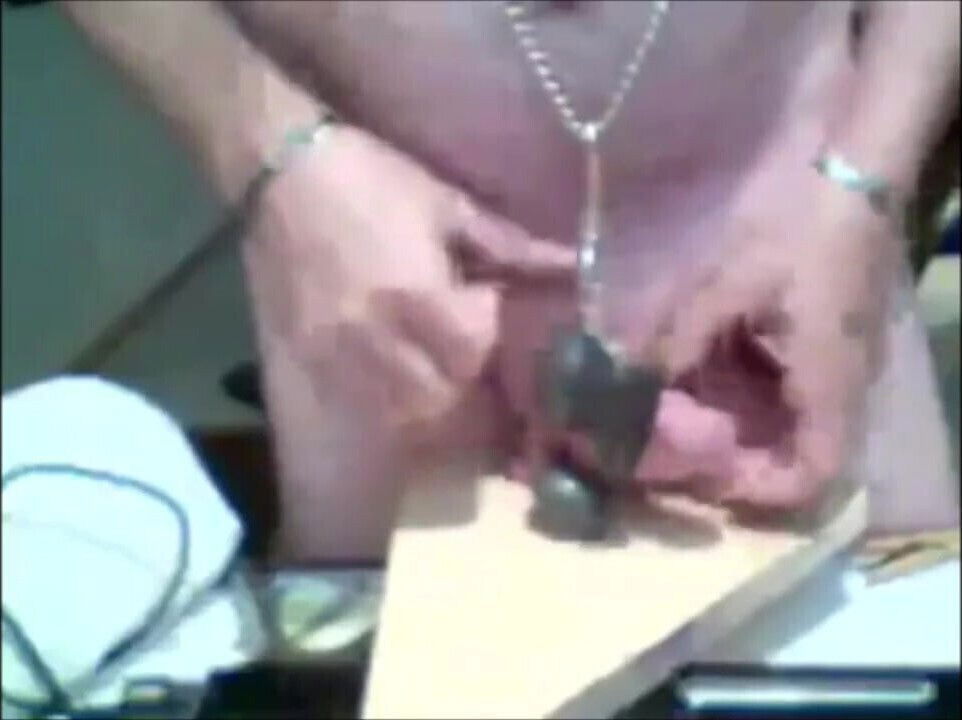 Penispain hammering his balls to a board with cumshot