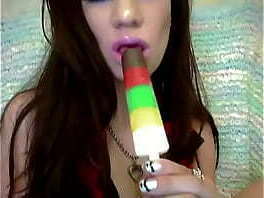 Sexy lip gloss popsicle sucking