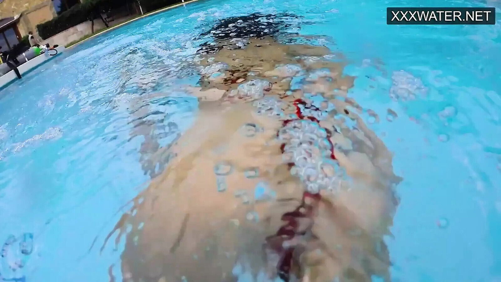 Lana Tanga toys herself underwater