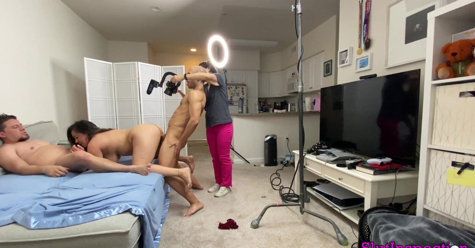 Steamy backstage with couple during Billy Visual's show